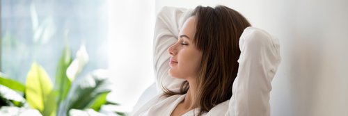 Beautiful,30s,Woman,Closed,Eyes,Put,Hands,Behind,Head,Relaxing